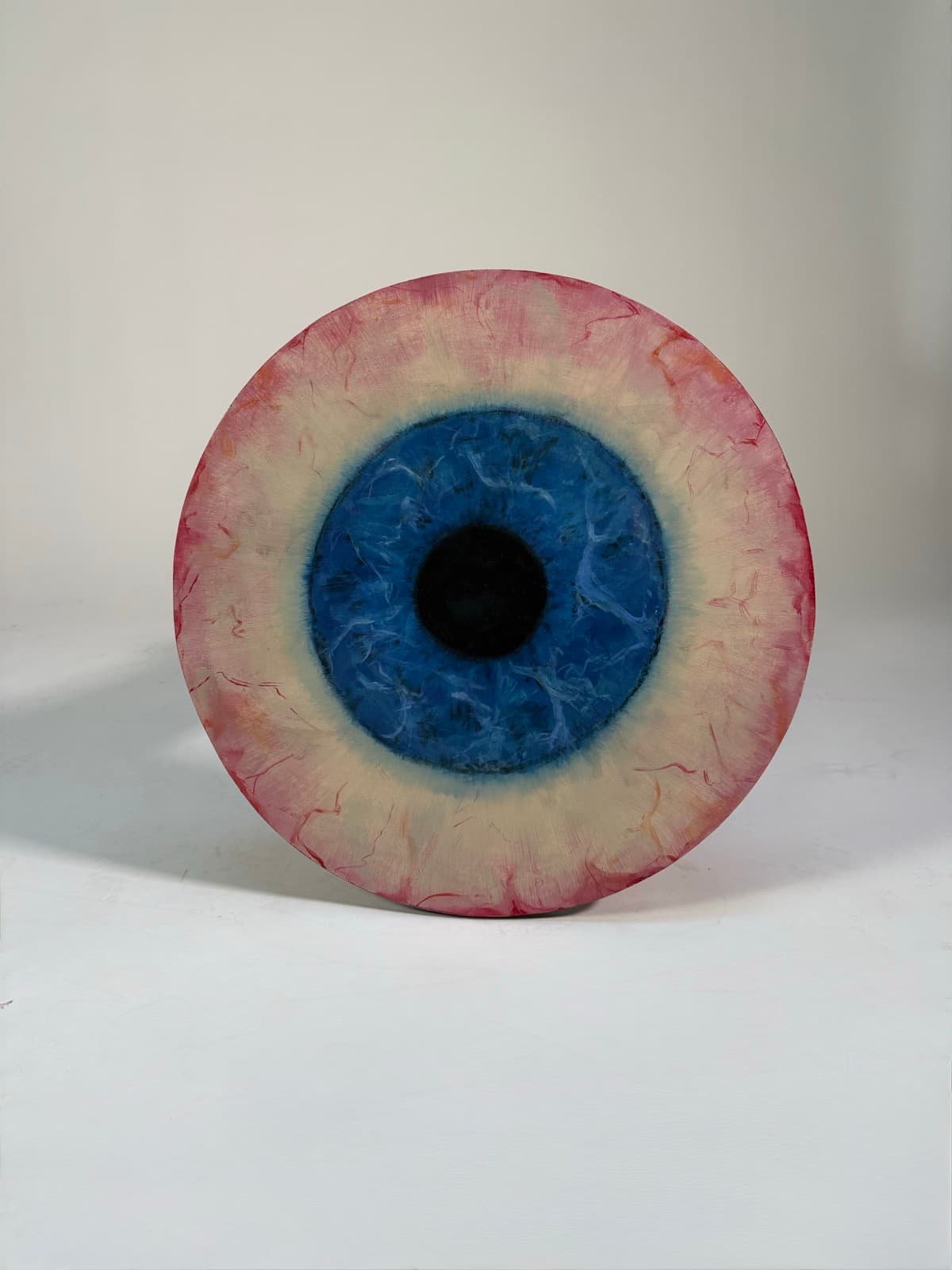 Top-down view of the eye table's painted tabletop from a slightly different angle