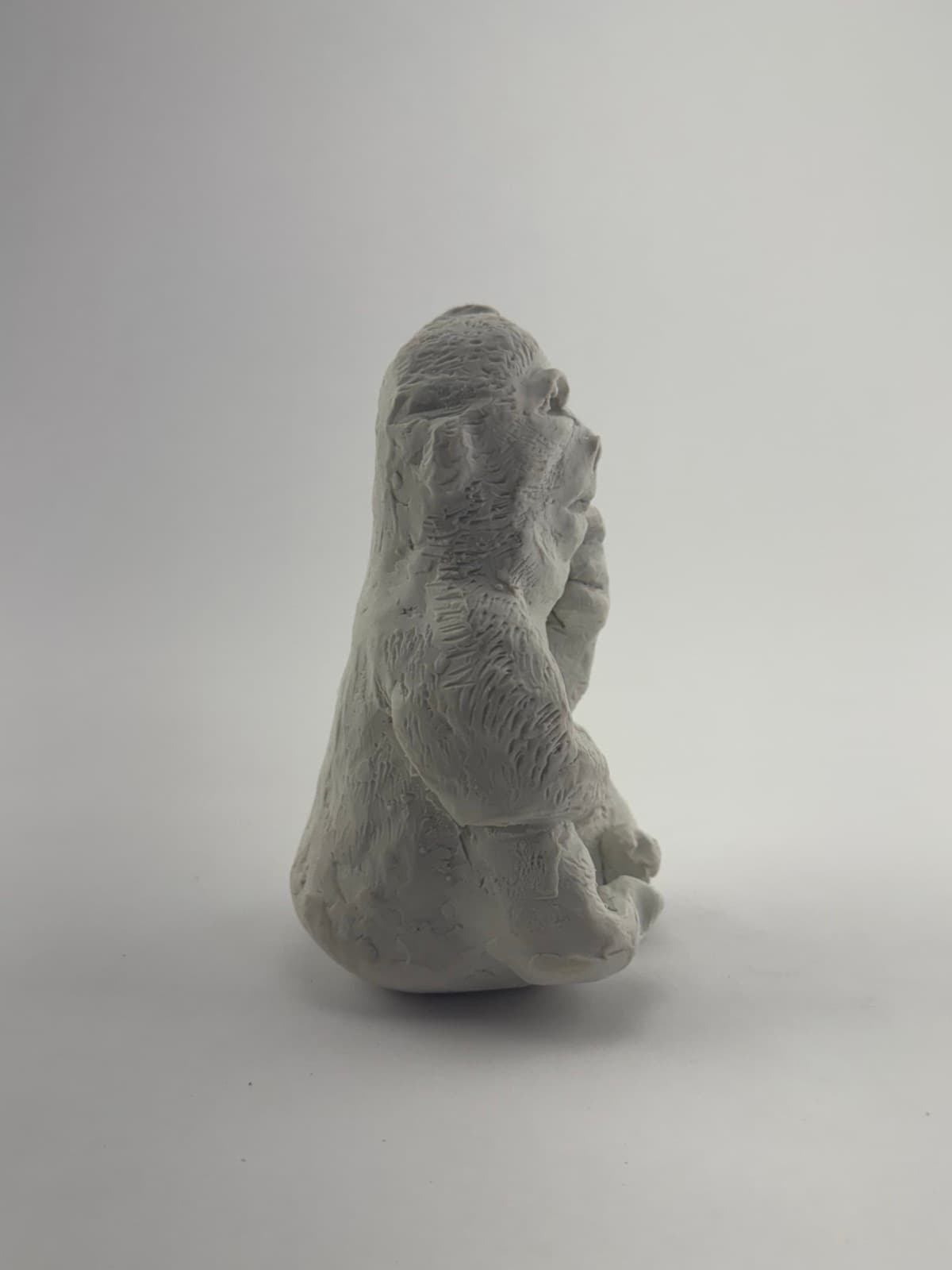 Back view of the hand-sculpted monkey sculpture
