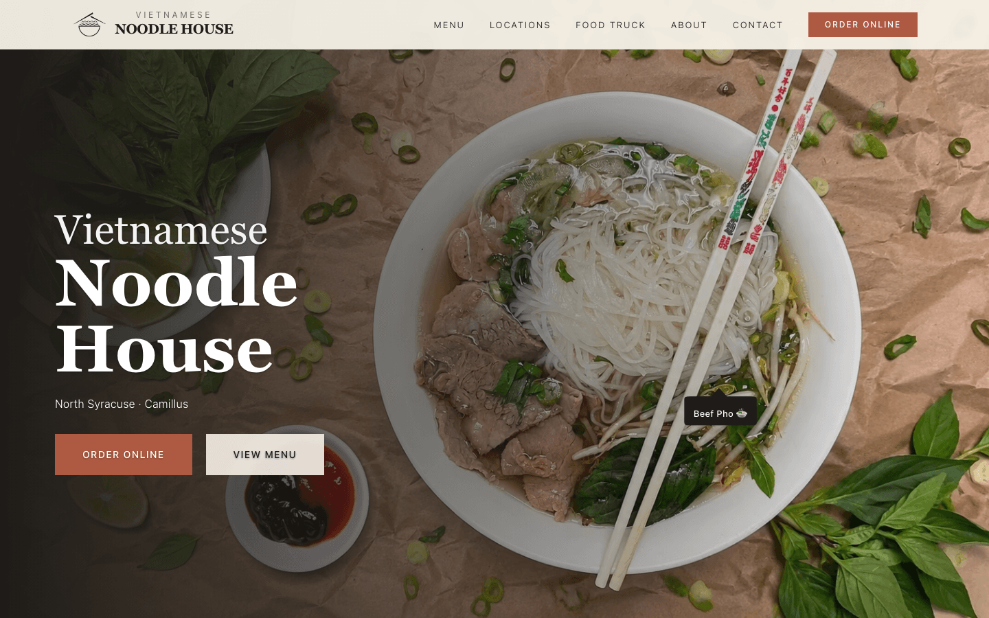 The redesigned Vietnamese Noodle House homepage hero: the site nav, a heading over a full-bleed photo of a bowl of pho, and an Order Online button.